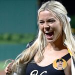 Olivia Dunne shows off "Yinz" shirt at Pirates game